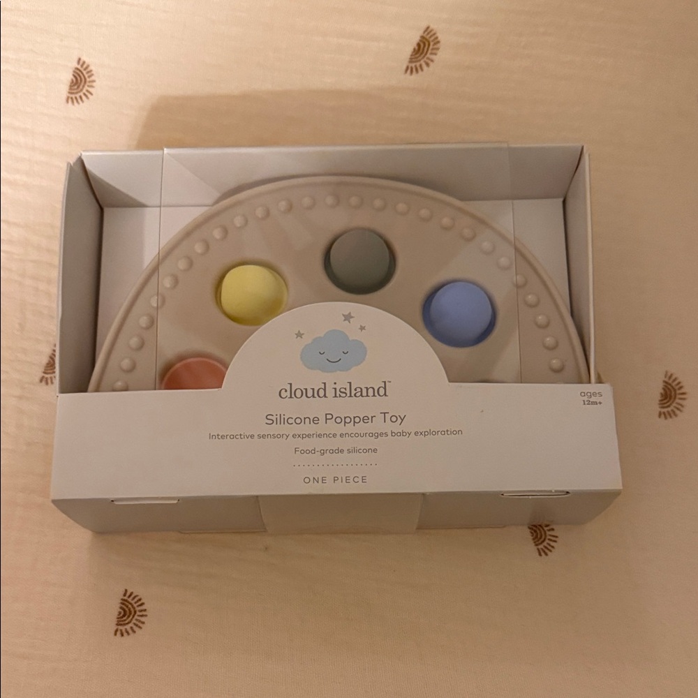 cloud island Silicone Popper Toy - Neutral with Pastel Dots